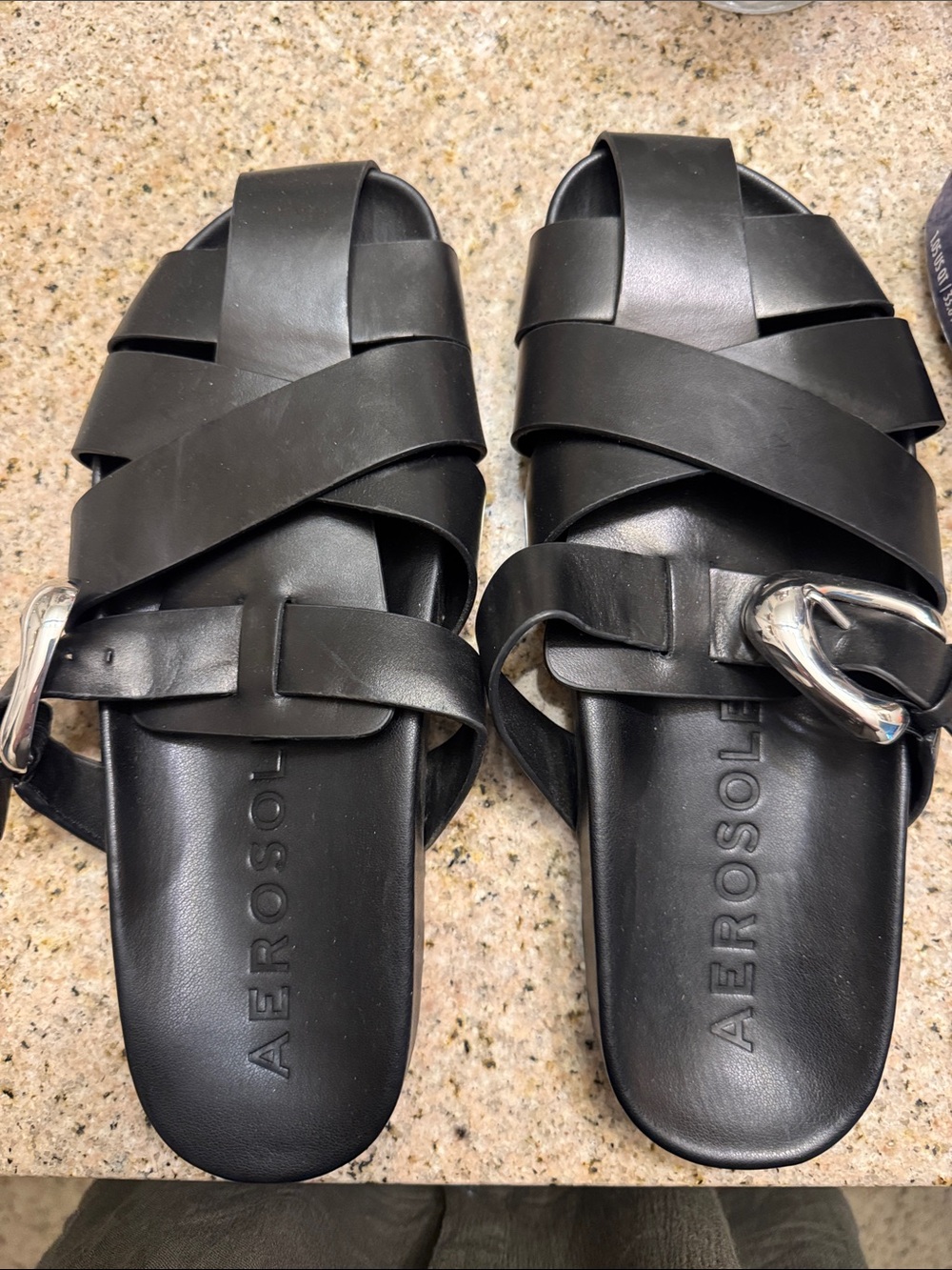 AEROSOLES Black Crisscross Leather Slide Sandals with Silver Buckles